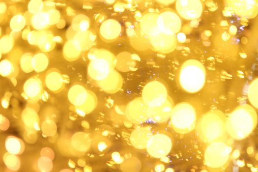 Bokeh background gold yellow colorful of merry christmas, Happy new year bokeh lighting shine on night background, Bokeh glitter light, Gold Luxury backdrop texture, Glittering wallpaper