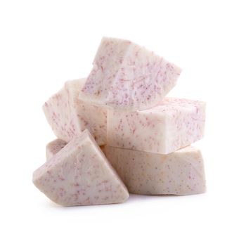 Cube of taro root isolated on a white background.