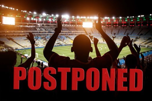 Postponement of a football match concept. Ban on mass events.