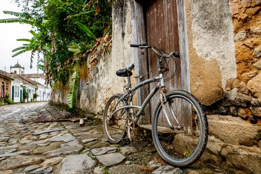 A bicycle parked on an old city street