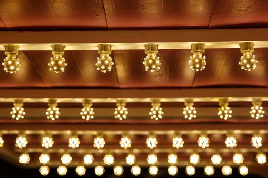 The row of incandescent bulbs. Lights background