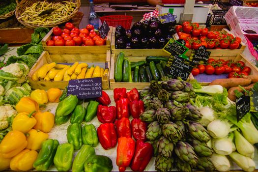 various vegetables on a market stall