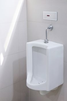 Urinals for men outdoor toilet, Urinals white ceramic at bathroom public, close-up white urinals