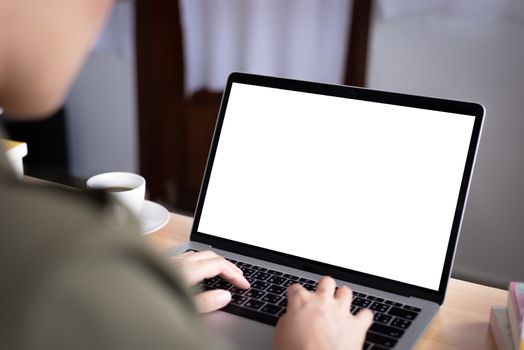Back side of Asian woman working from home with a blank screen and close-up view.