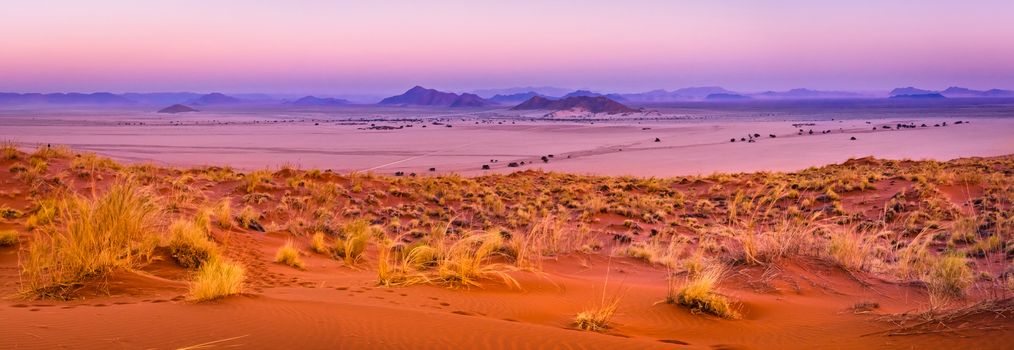View of Sesriem at sunset from the top of the Elim dune in Namibia in Africa.