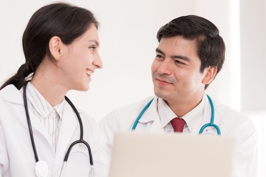 Two doctors have working together with happiness in the hospital.