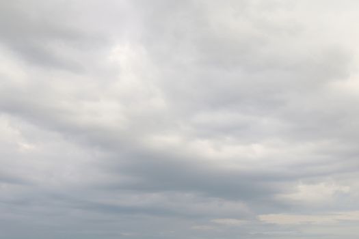 Sky white rain storm background, puffy gray white clouds soft background