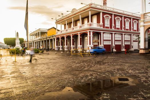 Granada, Nicaragua, October 2014: main square at sunset with view on colonial buildings. Long exposure.