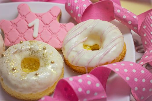 First birthday cookies - royal icing crown shape cookie and decorated donuts