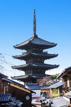 KYOTO, JAPAN - MARCH 12, 2018: Yasaka pagoda is a five-story pagoda. This is the last remnant of Hokanji Temple on a traditional street in old village, Kyoto, Japan.
