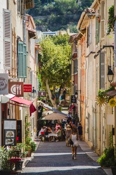 Looking down a coastal street in the South of France during summer