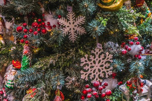 Christmas tree decorations close up hanging from a tree