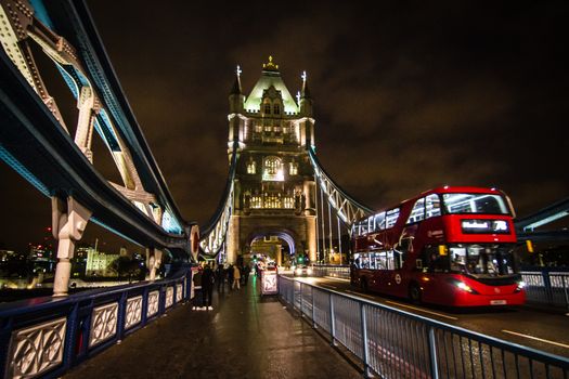 A London Red Bus at Night on Tower Bridge