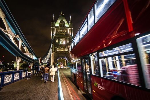 A London Red Bus at Night on Tower Bridge