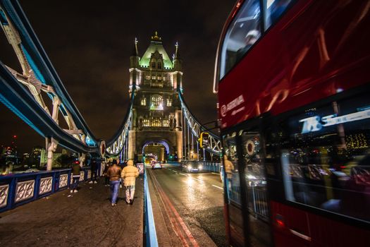 A London Red Bus at Night on Tower Bridge