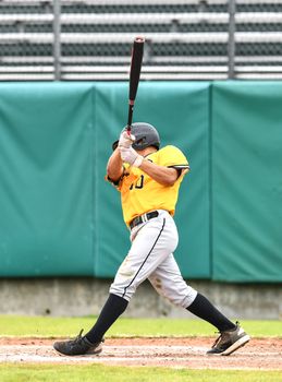 Action photo of high school baseball players making amazing plays during a baseball game