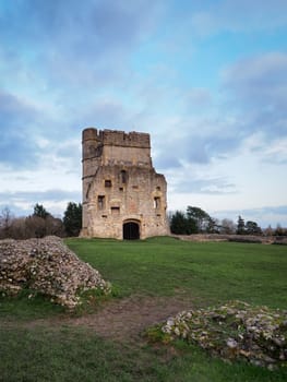 The gatehouse and ruins of the 14th century medieval Donnington Castle at sunset with colourful clouds in the evening sky, Newbury, Berkshire, UK
