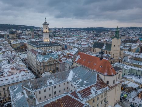 LVOV, UKRAINE, December. Panorama of the ancient city. Ukraine Lviv City Council, Town Hall. The roofs of old buildings. Aerial view. Winter