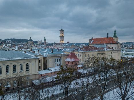 LVOV, UKRAINE, December. Panorama of the ancient city. Ukraine Lviv City Council, Town Hall. The roofs of old buildings. Aerial view. Winter