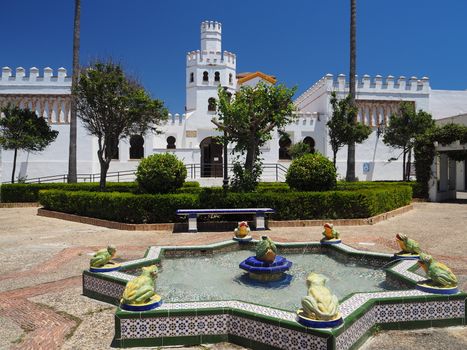 Plaza de Santa Maria or also known as Plaza de la Ranita, or Little Frog Square, with its unusual star-shaped fountain featuring eight ceramic frogs, Tarifa, Andalucia, Spain