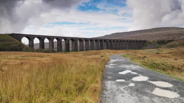 The iconic Ribblehead Viaduct or Batty Moss Viaduct which carries the Settle to Carlisle railway across Batty Moss in the Ribble Valley, Yorkshire Dales, UK