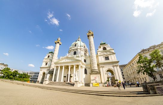 Vienna, Austria - June 7 2019: Wide Angle St. Charles Church (Karlskirche), is a baroque church located on the south side of Karlsplatz in Vienna, Austria. Widely considered the most outstanding baroque church.