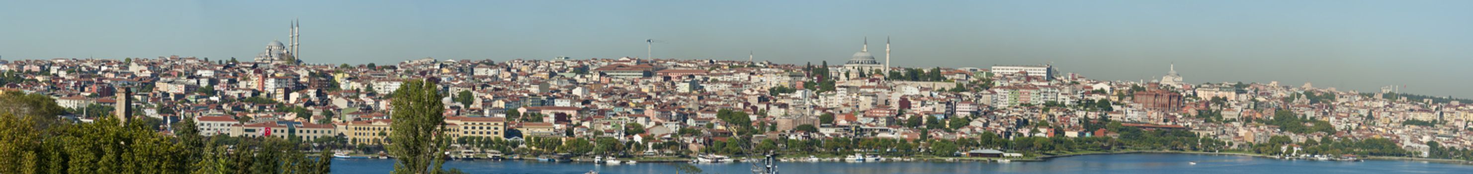 Panoramic cityscape of a residential area of a large city with a river