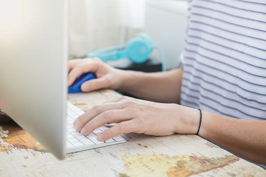 Business, Time, Technology, Work from home, Shelter in place Concept. Businessman typing and using desktop computer in his house.