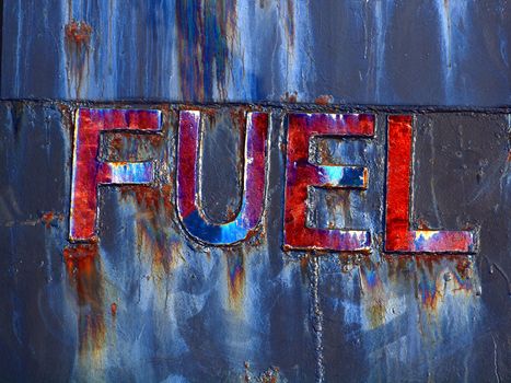 Grunge background illustrating the dangers of fuel made from oil
