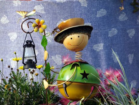 A garden light made in the shape of a funny figure

