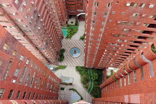 An apartment tower complex seen from the top
