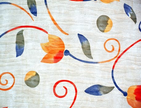 A coarse textile with an orange flower pattern