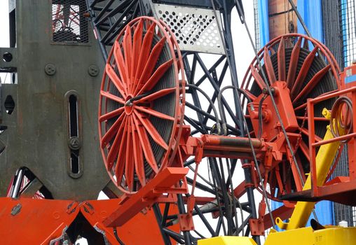 A large dredging crane with a clamshell excavator