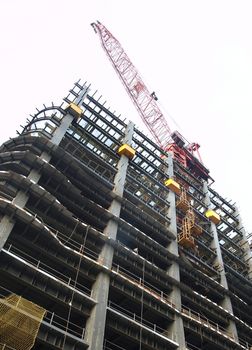 The massive steel frame of a modern building construction site