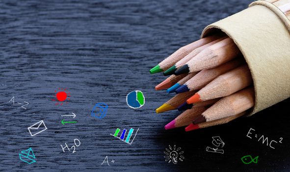 Education concept, knowledge management, color pencil on blackboard