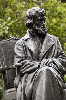 Bronze state of the historian Thomas Carlyle (1795 - 1881) in Chelsea, London. The statue by Edgar Boehm was unveiled in 1882 and has been on public display ever since.