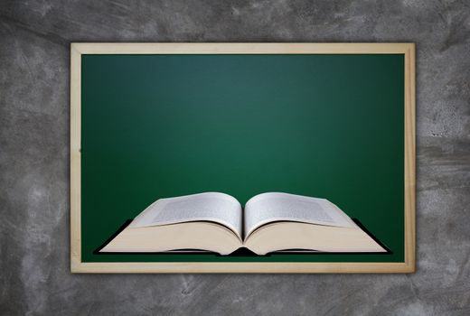 Education concept, knowledge management, open book on blackboard background