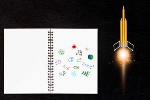 Education concept, knowledge management, yellow pencil rocket on chalkboard background