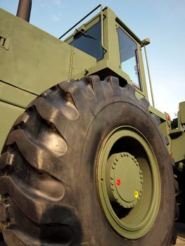 Massive tire of a military earth moving equipment vehicle
