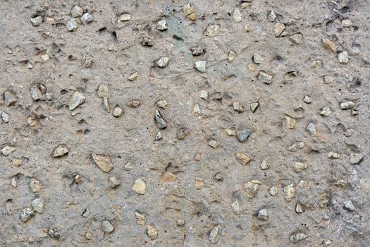 seamless flat concrete with rocks - grey texture and background.