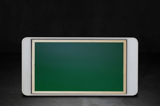 Education technology, online learning concept, mobile phone and chalkboard background