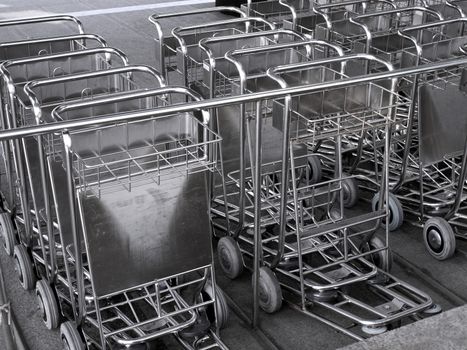 Stainless steel carts for luggage transportation at the airport
