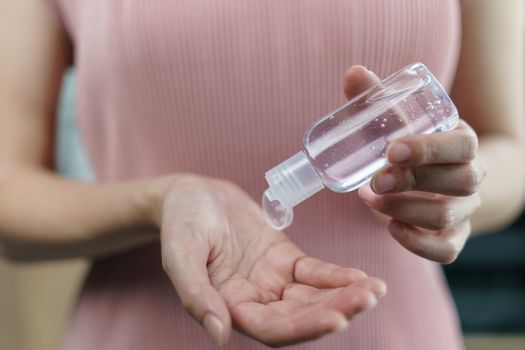Hand wash with disinfectant gel dispenser during the epidemic covid-19.