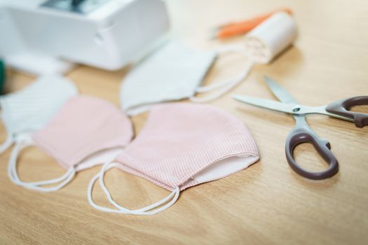 Fabrics and sewing accessories for sewing an anti-virus face mask during the coronavirus pandemia.