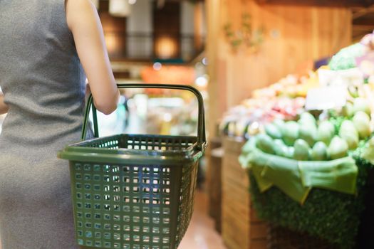 shopping in supermarket with shopping basket
