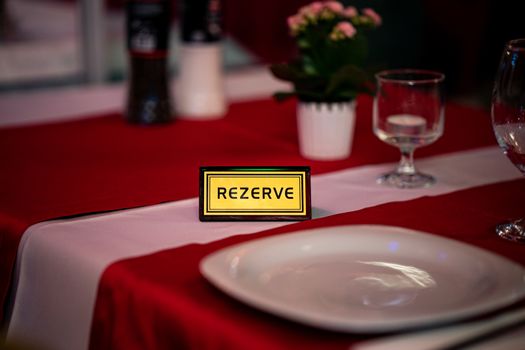 Reserved Card in a restaurantม text in turkey language.