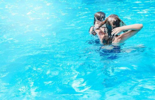 Happy GIRLS are HAPPY to SWIM AND DIVE in the POOL and have fun in the water rest.