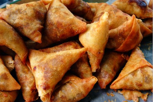 samoosa is a fried or baked pastry with a savoury filling
