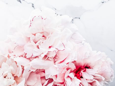 Bouquet of peony flowers on luxury marble background, wedding flatlay and event branding design