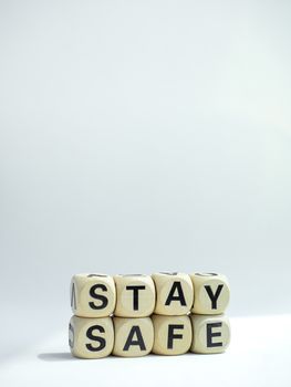 Stay safe concept. Word "Stay Safe" isolated on white background with copy space. Stay at home, social media campaign for covid-19 or coronavirus pandemic prevention.